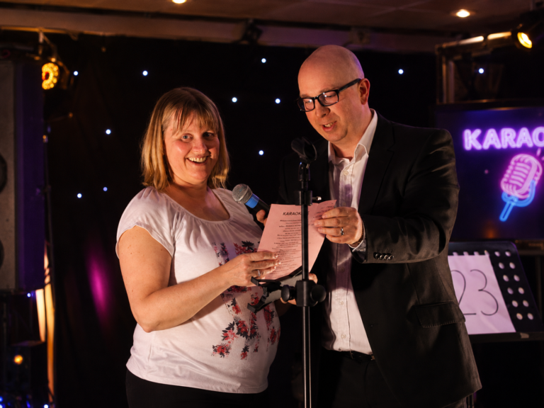 Guests singing during a hosted karaoke night