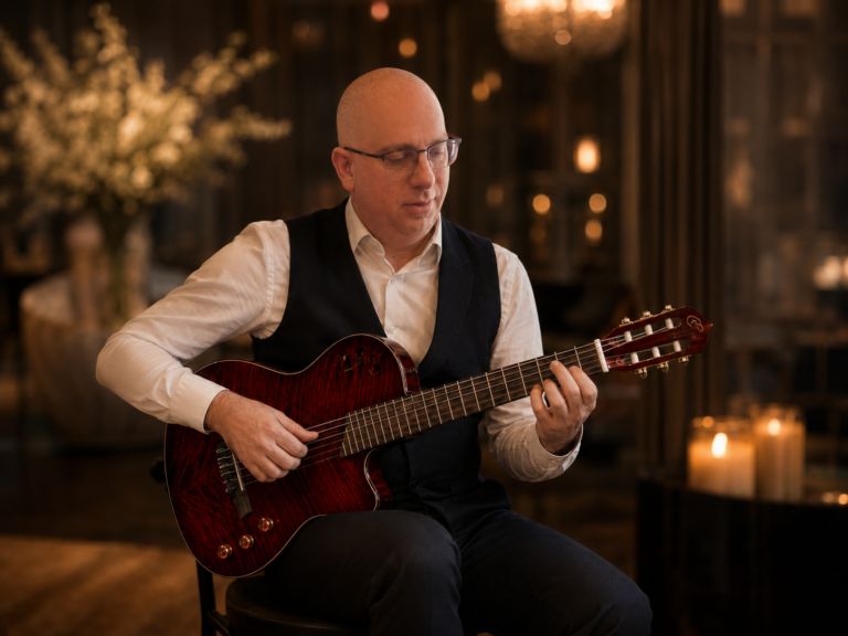 Ben Field performing classical guitar at an event