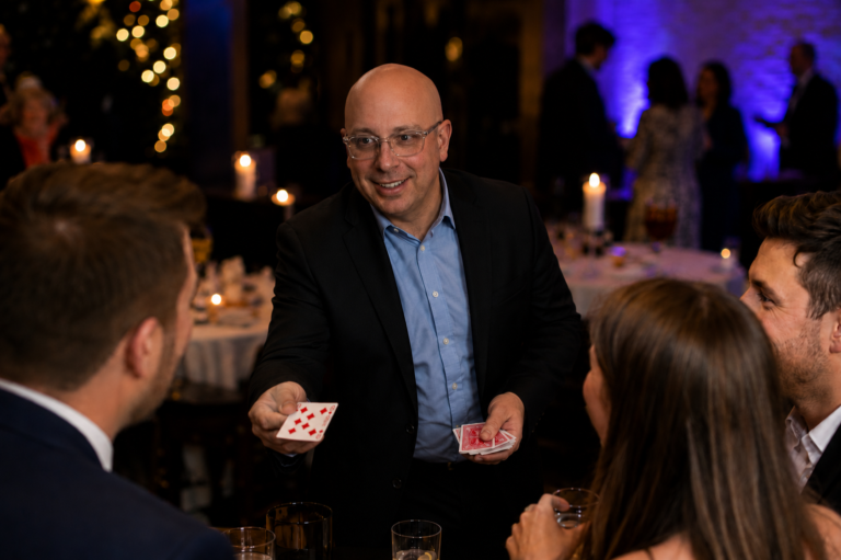Ben Field performing close-up magic for guests